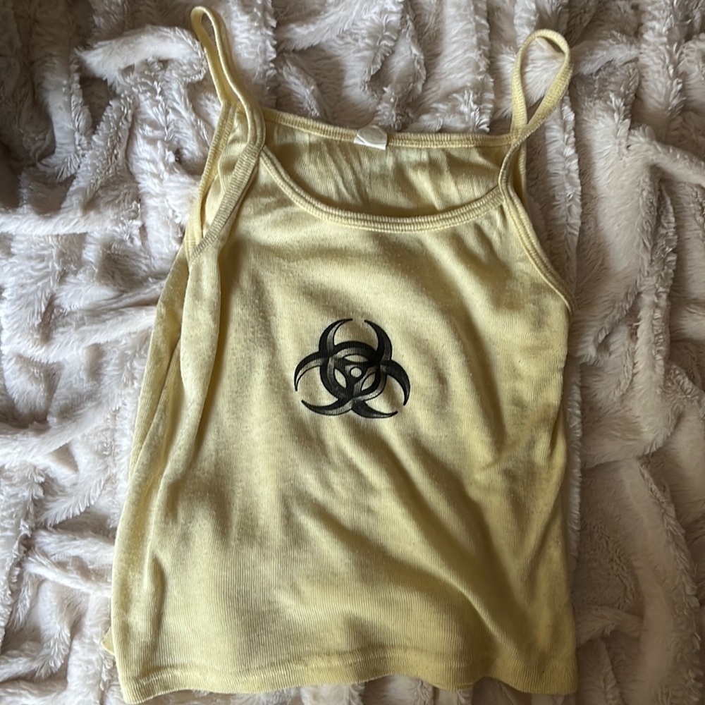 Small yellow crop top with hazard symbol